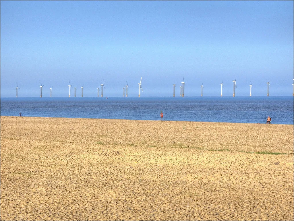 Great Yarmouth beach with the offshore wind farm on the horizon